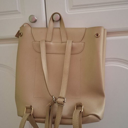 Backpack bag gold color like new