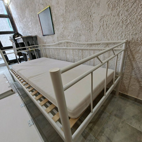 Iron bed used with drawers