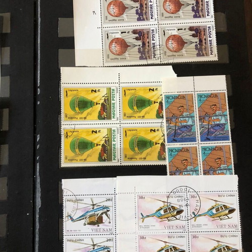 Stamp album with large collection of mint and used blocks worldwide