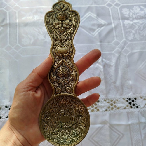 Brass decorative item like new with intricate carvings 24 cm long
