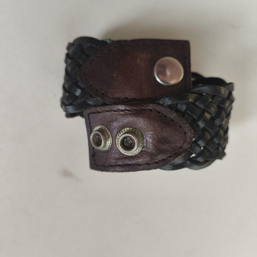 Leather bracelet used, black with brown details, sturdy weave
