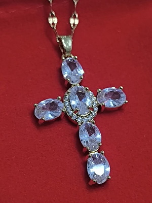 Elegant cross necklace with white stones in gold tone, new