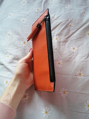 Orange wallet with six card slots and two bill compartments