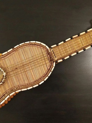 Handmade decorative old guitar like new made of sticks