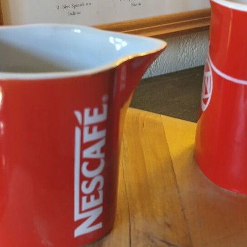 Collectible Nescafé cups and milk jug like new
