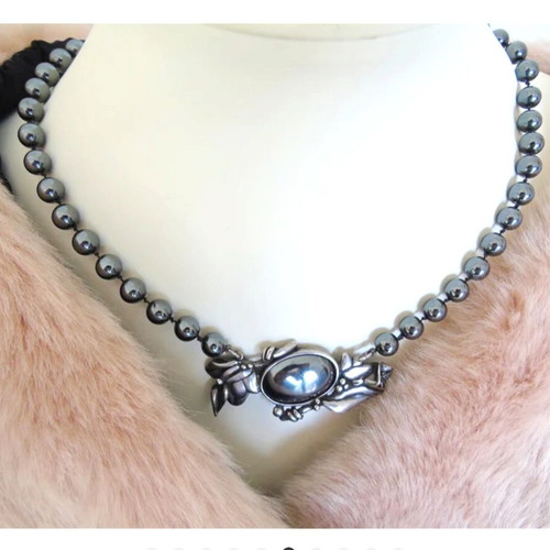 Vintage necklace with hematite beads and motif-pin used, gray