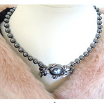 Vintage necklace with hematite beads and motif-pin used, gray