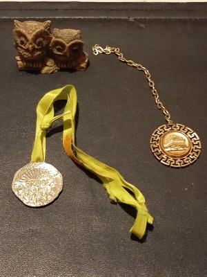 Tourist medals used with owl gift