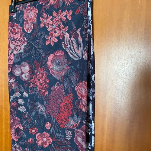 Set of two pencil skirts used, black and white and floral