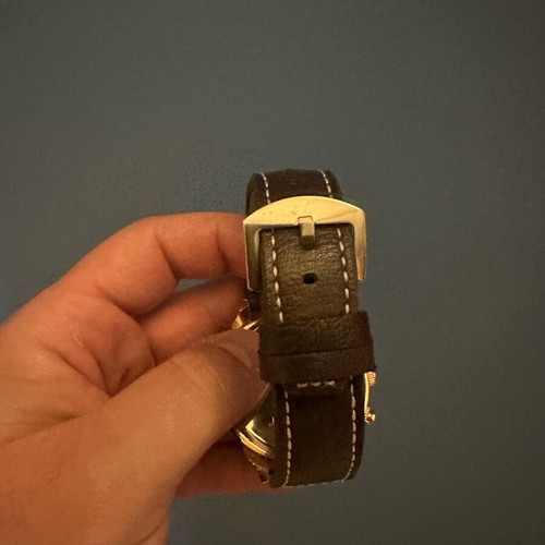 Wristwatch new with leather strap and white stitching