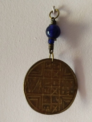 Wall decoration used, bronze with prosphoro seal and blue bead