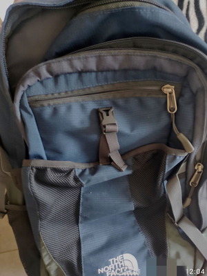 The North Face back bag used, gray and blue