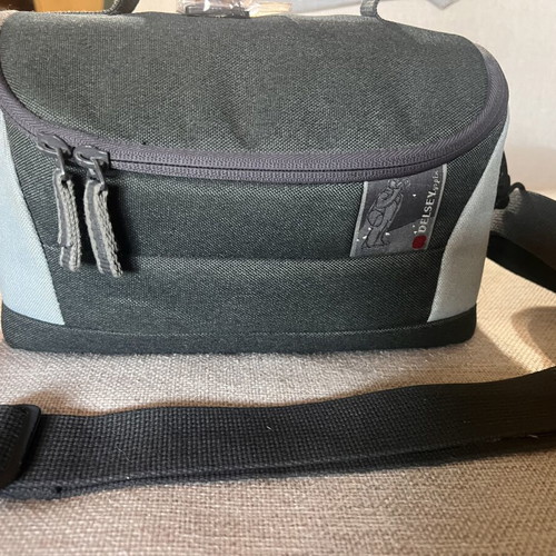 Nikon F65 SLR 35mm camera with AF Nikkor 28-80mm lens and Delsey case