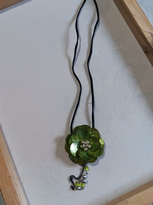 Necklace with green flower A.L.E. like new
