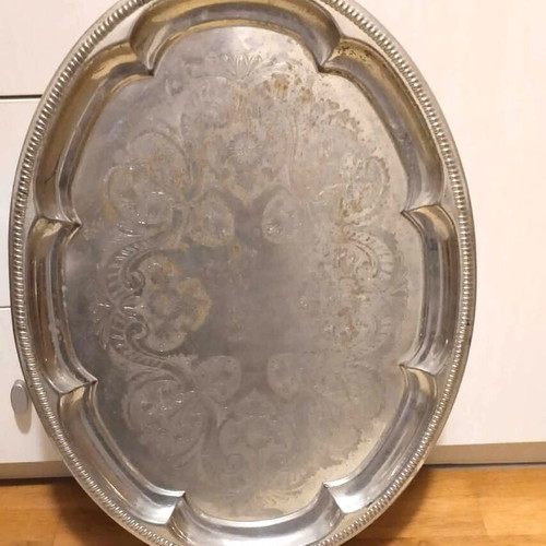Silver-plated serving tray used with ornate handles