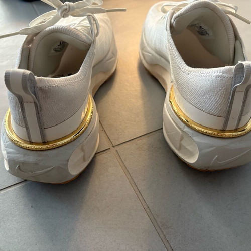 Nike running shoes size 40 like new beige with gold details
