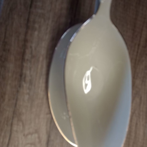 Gravy boat and deep plate used with floral patterns