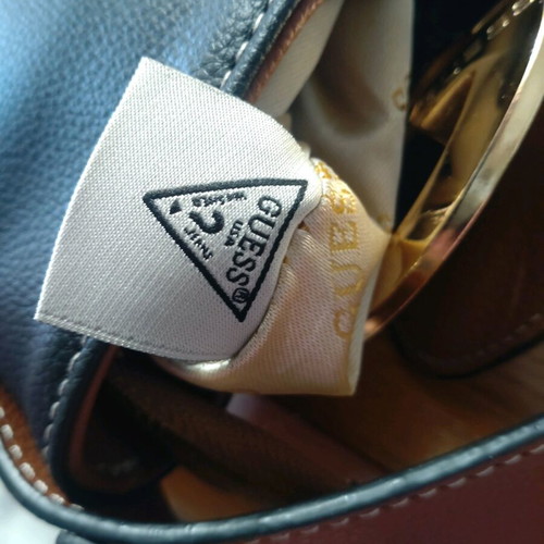 Guess shoulder bag like new, black with tan
