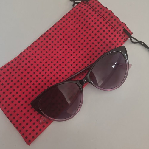 Guess children's sunglasses with pink frame and purple lenses