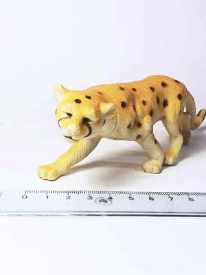 Animal plastic figure used with marks and scratches