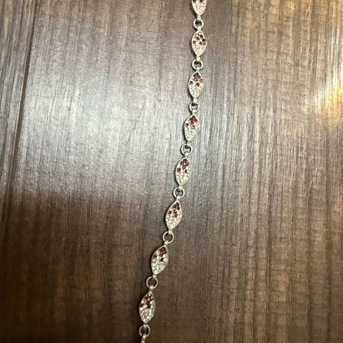 Steel bracelet like new with pink and silver color and clasp