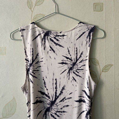White elastic dress with unique design and side ties, like new, sizes S/M