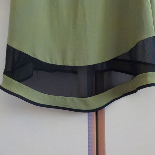 Green dress used with zipper and black transparency