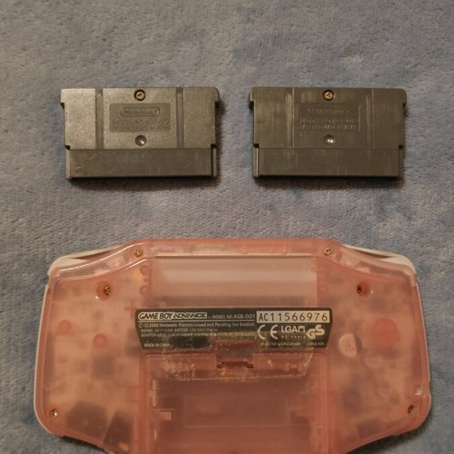 Nintendo Gameboy Advance Fuchsia like new with Warioland 4 and Sonic Advance