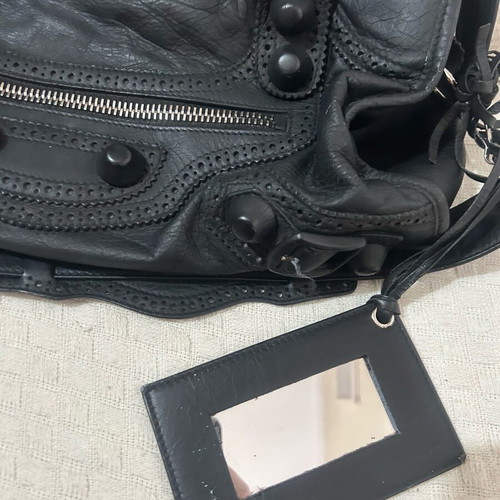 Balenciaga handbag used with long shoulder strap and company mirror