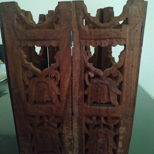 Wooden carved folding decorative item used