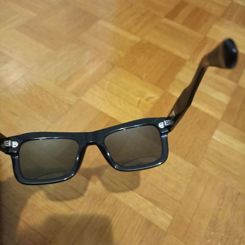 Epos sunglasses new with leather case, black lenses