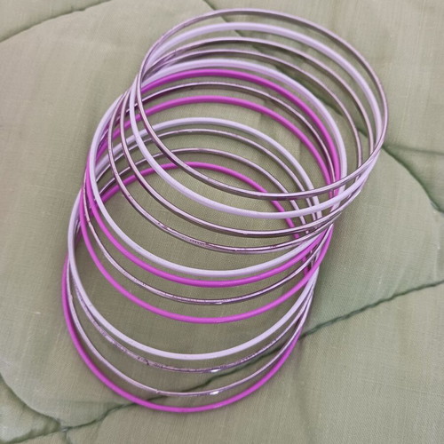 Set of 12 silver, white and pink steel bracelets like new