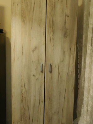 Clothing closet composite wood color with 2 doors