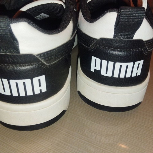 Puma kids' athletic shoes for boys, black and white, size 38