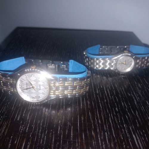 Akashi men's and women's watch set like new, gold and silver