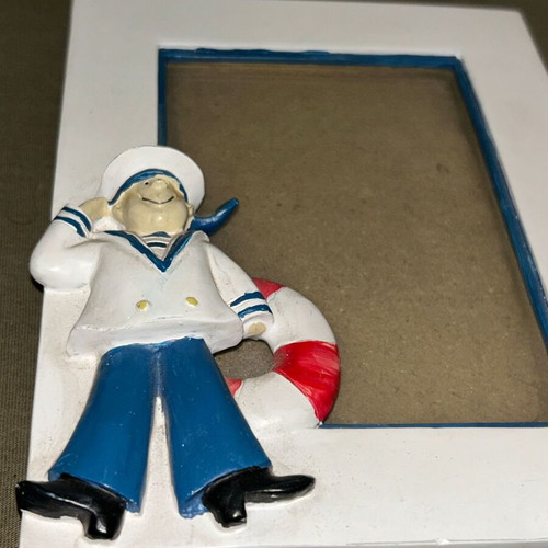 Nautical themed table photo frame with sailor and lifebuoy, polyresin