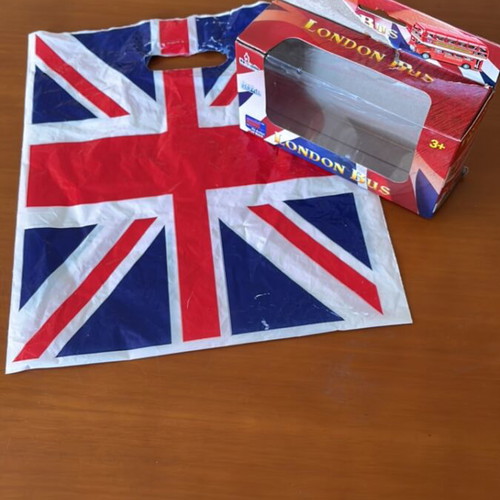 Plastic bag with English flag and small empty London bus box like new