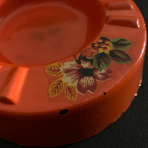 Vintage orange glass ashtray used