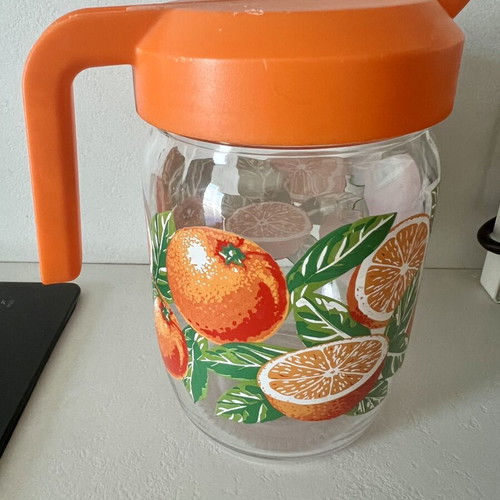 Vintage Bormioli Rocco glass carafe with plastic lid used
