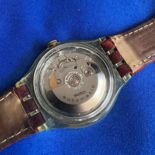 Swatch automatic wristwatch, red fabric and leather strap