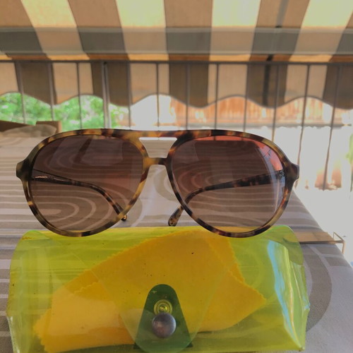 Michael Kors sunglasses used tortoise brown with gradient lenses