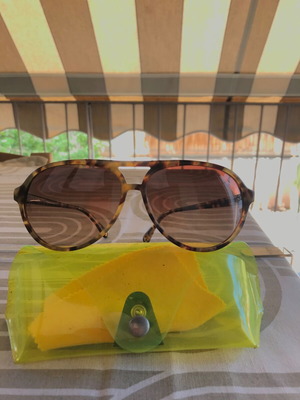 Michael Kors sunglasses used tortoise brown with gradient lenses