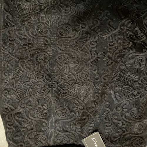 Zinas black mini pencil skirt made of embossed brocade fabric
