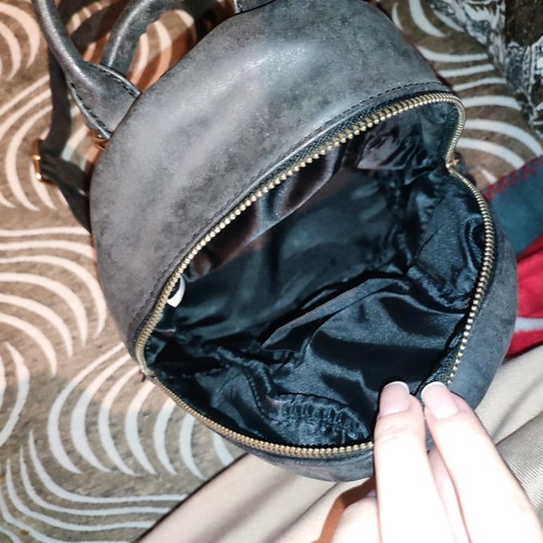 Small backpack used with small and large pocket
