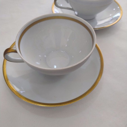 Porcelain tea cup set used, two cups with saucers