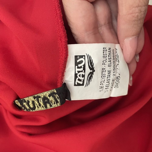Red midi skirt with asymmetric design by TATU like new