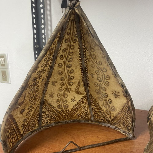 Leather wall sconces like new with Moroccan designs for exotic atmosphere