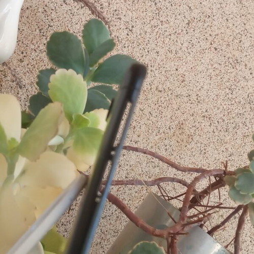 Redmi 6A black back cover with cracked camera lens
