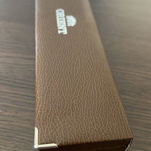 Orient watch case like new with strap and side mark