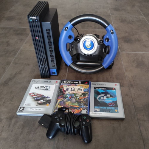 PlayStation 2 console used with controller, Hurricane wheel and 3 games